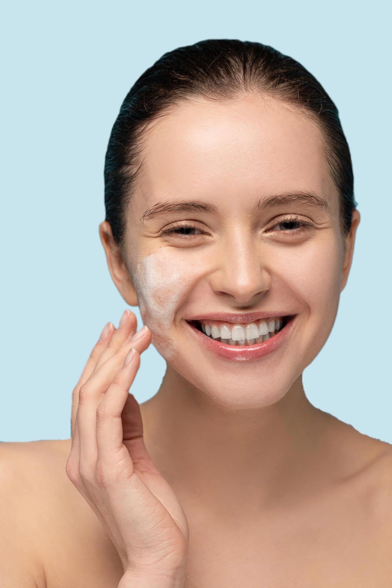 smiling-girl-applying-cleansing-foam-on-face-isol-2023-02-15-05-57-33-utc.jpg